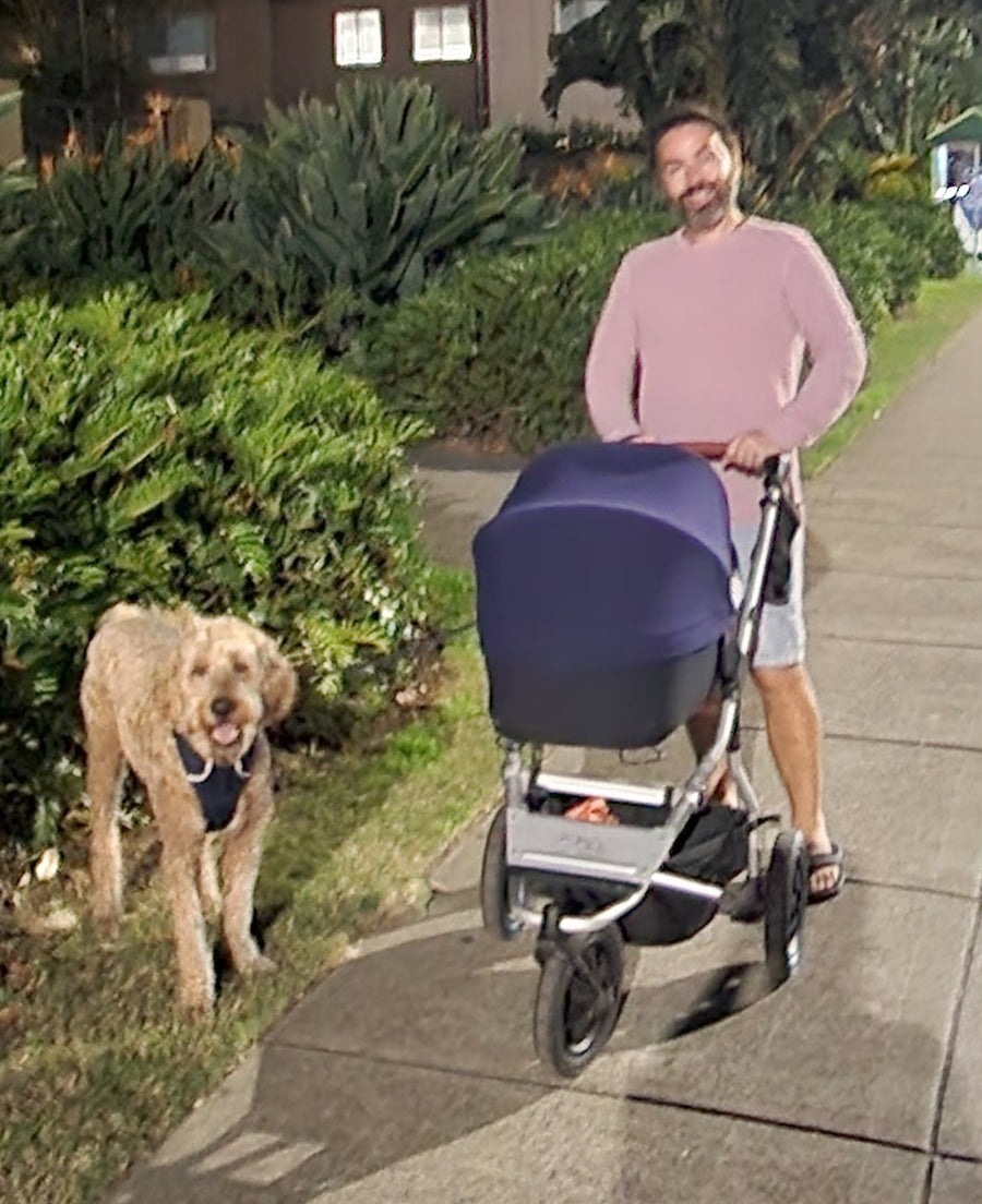 Scott and Buddy practising empty pram walks before Joy arrived.